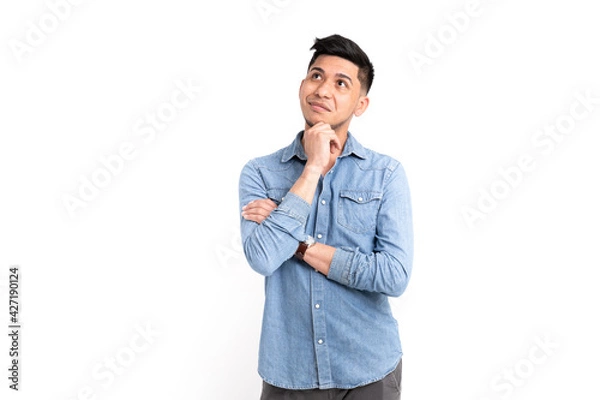 Obraz Latino man in pensive pose on white background