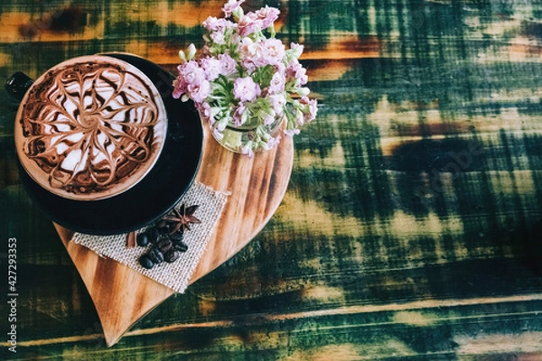 Obraz Latte on a texture table in a black cup