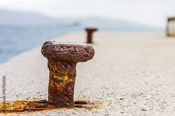 Fototapeta Rusted bollard still image.