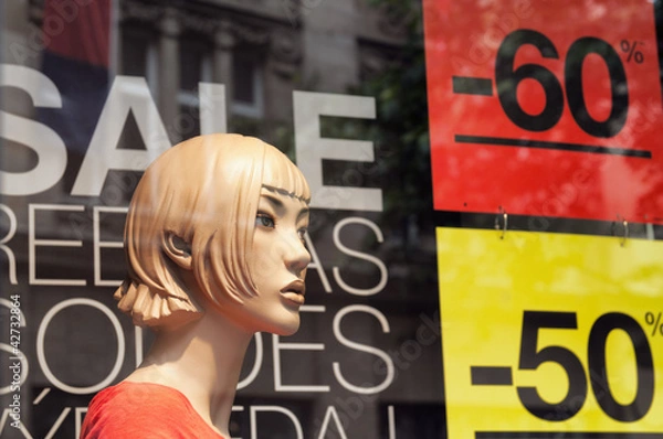 Obraz Discount signs in a shop window.