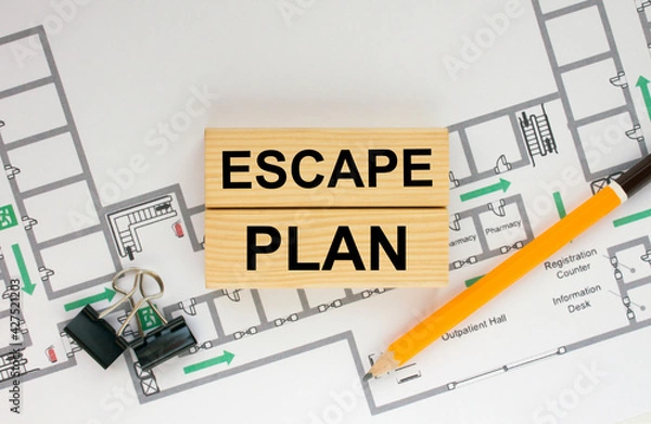 Obraz Construction drawings and wooden bars with text Escape Plan and paper clips