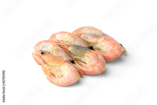 Fototapeta Unpeeled shrimps isolated on white background.
