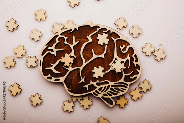 Fototapeta Brain with wooden puzzles. Mental Health and problems with memory