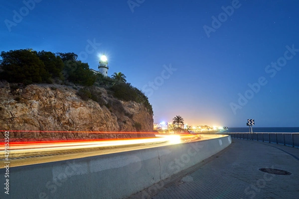 Fototapeta Calella - Spain - lighthouse at night