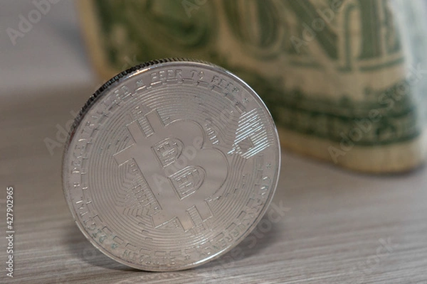 Obraz bitcoin coin on a dollar background