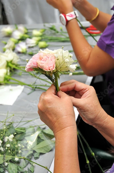 Obraz Hand Arranging Flower