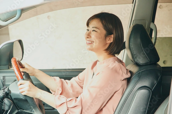 Obraz Asian woman driving car portrait