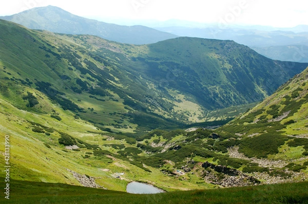 Obraz landscape with mountains and clouds