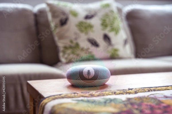 Fototapeta voice controlled smart speaker in a interior home environment. Smart AI speaker concept