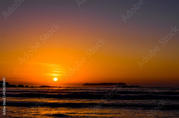 Fototapeta When the sea turns into gold and the sky gets on fire, we all say WOW!!!