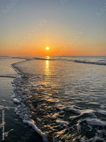 Fototapeta sunset over the sea