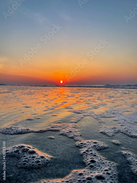 Fototapeta sunset over the sea