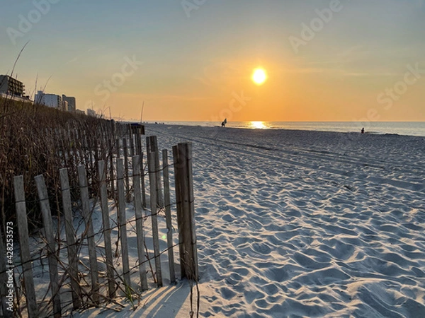 Fototapeta sunrise on the beach