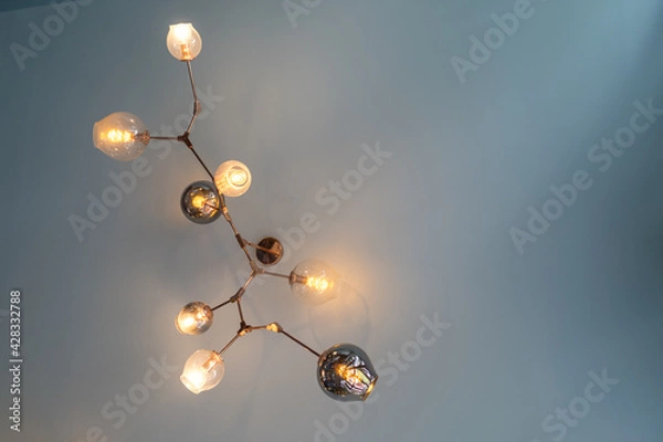 Fototapeta Stylish lights on gray ceiling