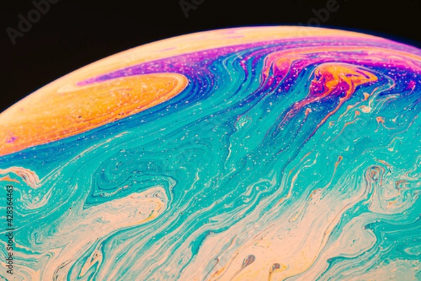 Fototapeta Fluid art made of colorful soap bubble film. Trendy Inkscape blurred background. Alien space planets art. Selective focus.