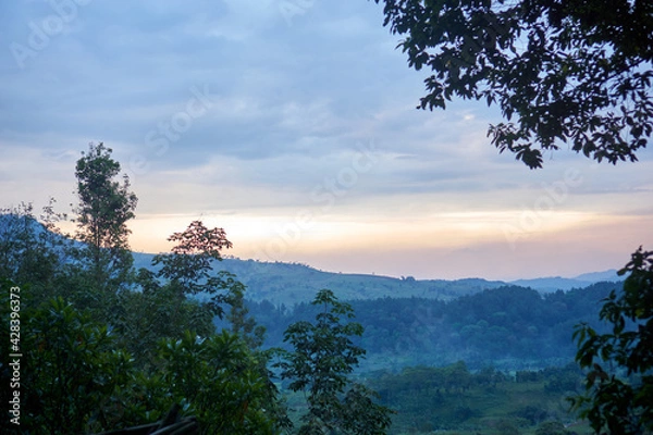 Fototapeta sunset over the mountain