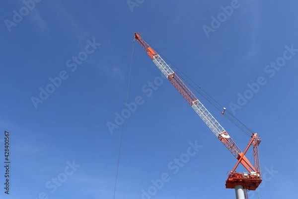 Obraz 日本の建設現場のクレーンと青空
