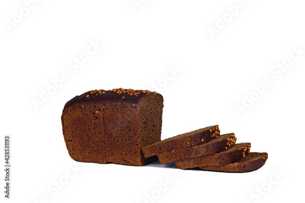 Fototapeta Black bread with caraway seeds sliced partially into slices on a white plate.