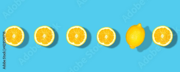 Obraz flat lay .Fresh yellow lemons overhead view