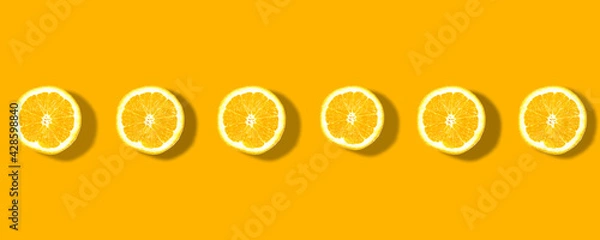 Obraz flat lay .Fresh yellow lemons overhead view
