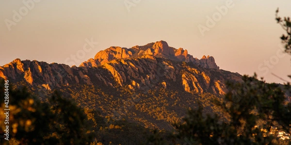 Obraz peaks of a mountain range at sunset or sunrise