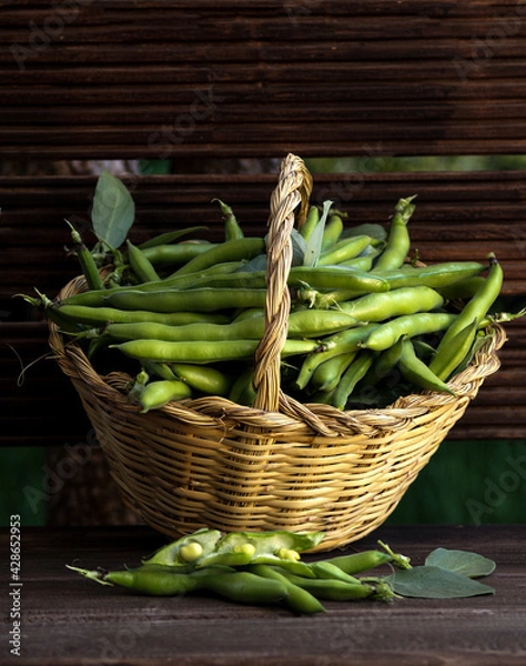 Obraz green broad beans in a basket