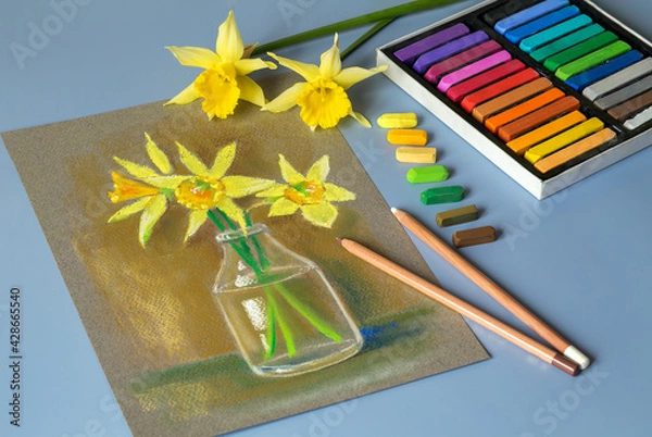 Fototapeta Soft pastel painting at home. Wonderful bouquet of daffodils, painted in pastel on paper. Colored pastels set. 
