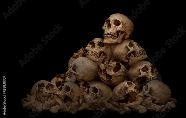 Fototapeta Awesome pile of skull and bone on brown cloth background, Still Life style, selective focus, Adjustment color for background