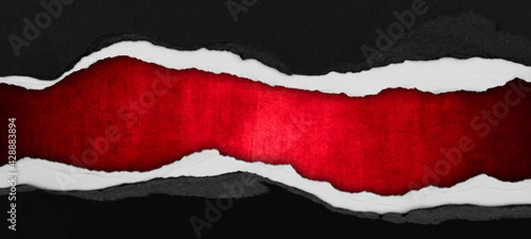 Obraz Ripped paper on red