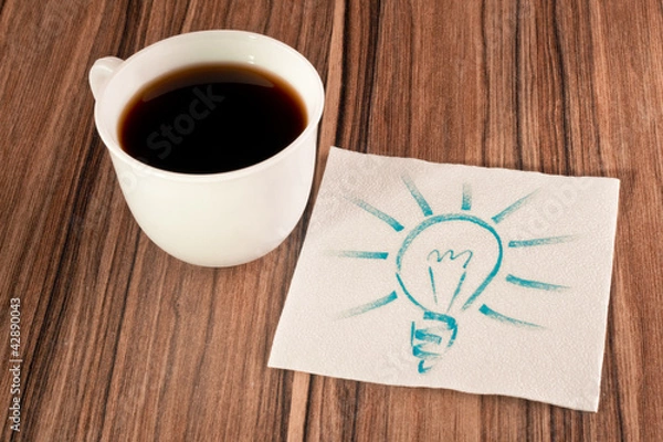 Obraz Light bulb on a napkin