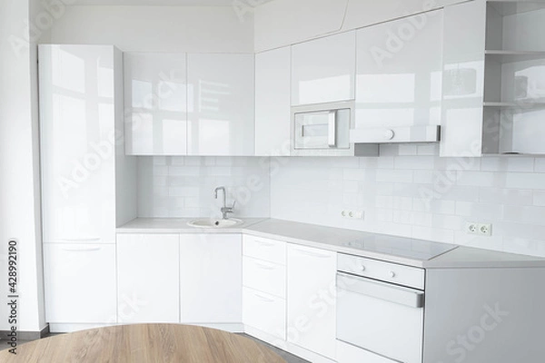 Obraz modern white kitchen interior, new white kitchen furniture.