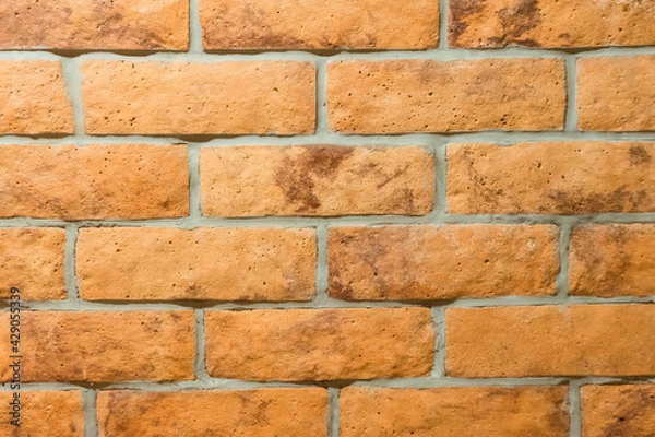 Fototapeta Orange bricks on the wall texture and background