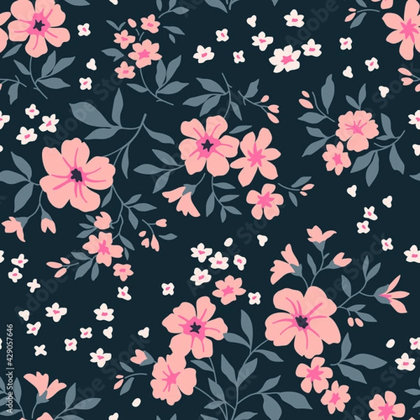 Fototapeta Vintage seamless floral pattern. Liberty style background of small pink flowers. Small blooming flowers scattered over a navy blue background. Stock vector for printing on surfaces and web design.