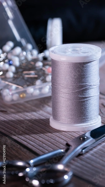 Obraz close up of grey thread