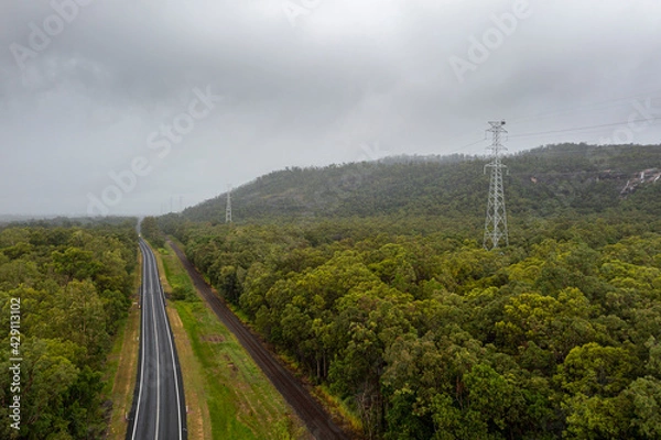 Obraz Bruce Highway through the rainforest area between Cardwell and Ingham, North Queensland