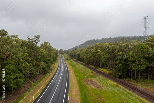 Obraz Bruce Highway through the rainforest area between Cardwell and Ingham, North Queensland