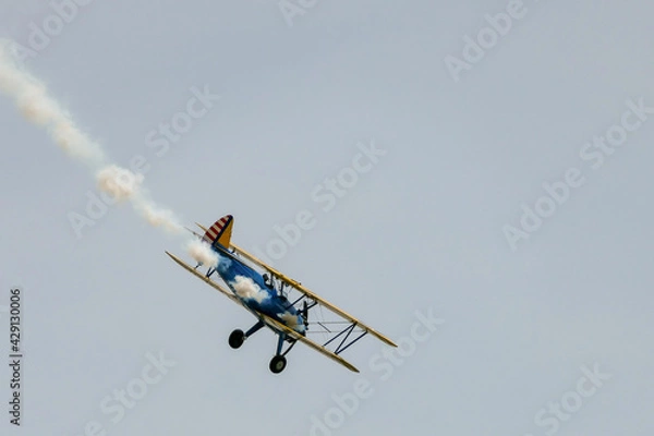 Fototapeta biplane in the sky