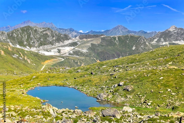 Obraz alpine mountain landscape  with a little lake in rocky meadow