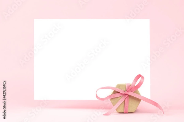Fototapeta Blank paper for your text or design pink and white colour, holiday concept. Copy space.