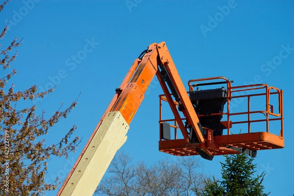Fototapeta Hydraulic system elevated platform sky elevated work platform