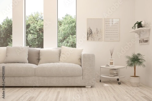 Fototapeta White living room with sofa and summer landscape in window. Scandinavian interior design. 3D illustration