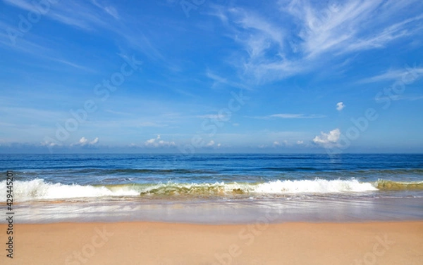Fototapeta Phuket beach sand and sky in Thailand. Crystal clear water and the sky. Landscape view of beach in summer day morning.