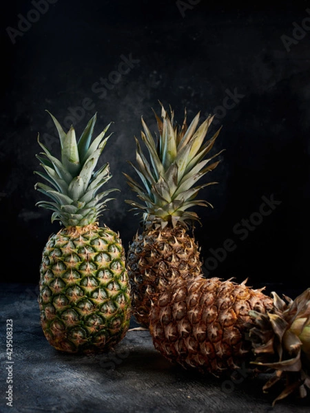 Obraz Fresh pineapple on dark background