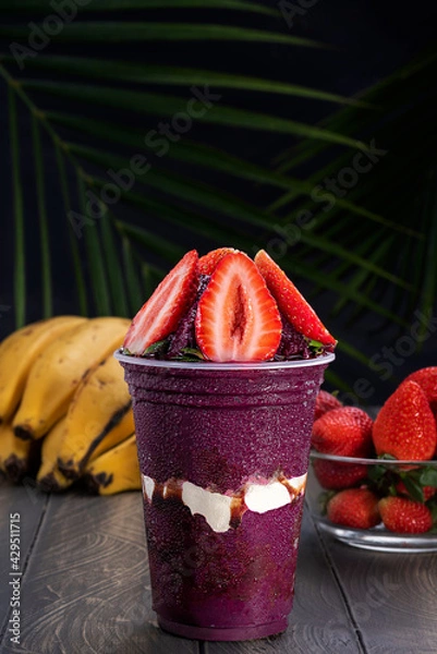 Obraz Acai cup with strawberry topping.