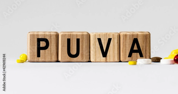 Fototapeta cubes with the word PUVA on them. Care concept.