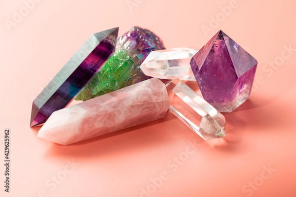 Obraz Various crystals for healing and magical practices. Faceted amethyst, rose quartz, fluorite, rock crystal, quartz cluster on pastel background