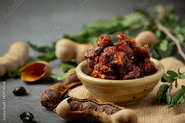 Obraz fresh sweet ripe tamarind on dark backgroud