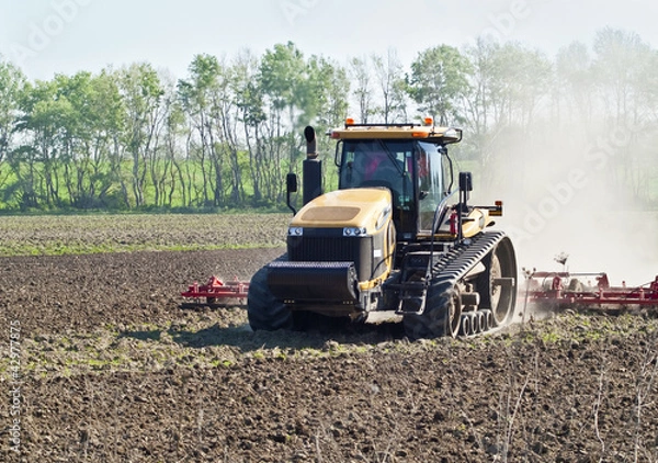 Obraz Tractor on a field