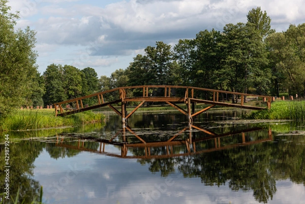 Fototapeta View to the bridge in the park