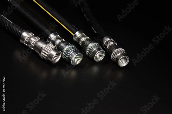 Obraz Brake Hoses on black background.